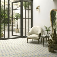 Bodenfliesen (Feinsteinzeug) sechseckig mit grün-gelbem Dekor in einem Wintergarten