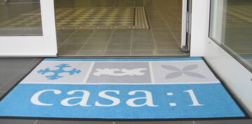 Eingang zum Showroom von Casa:1 Zementfliesen